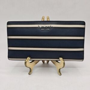 kate spade navy and white striped card case with silver logo
